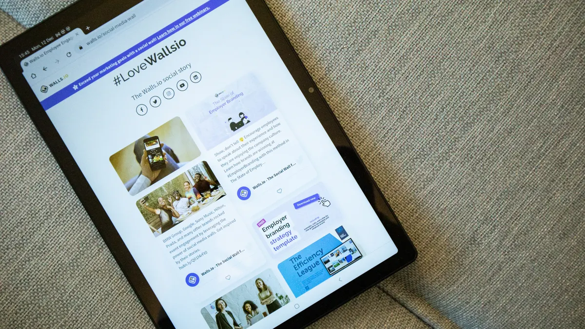 How to compare your content to a competitor page How to compare your content to a competitor page — Tablet Displaying Front Page of Walls.io Website