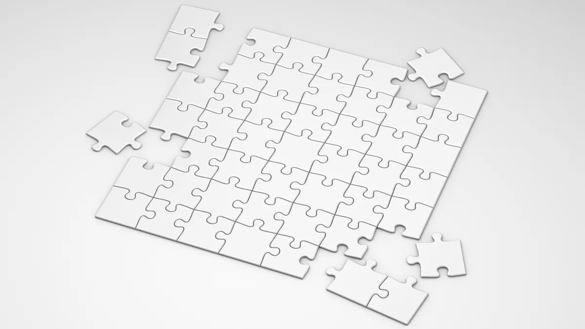 partially assembled jigsaw puzzle with missing pieces