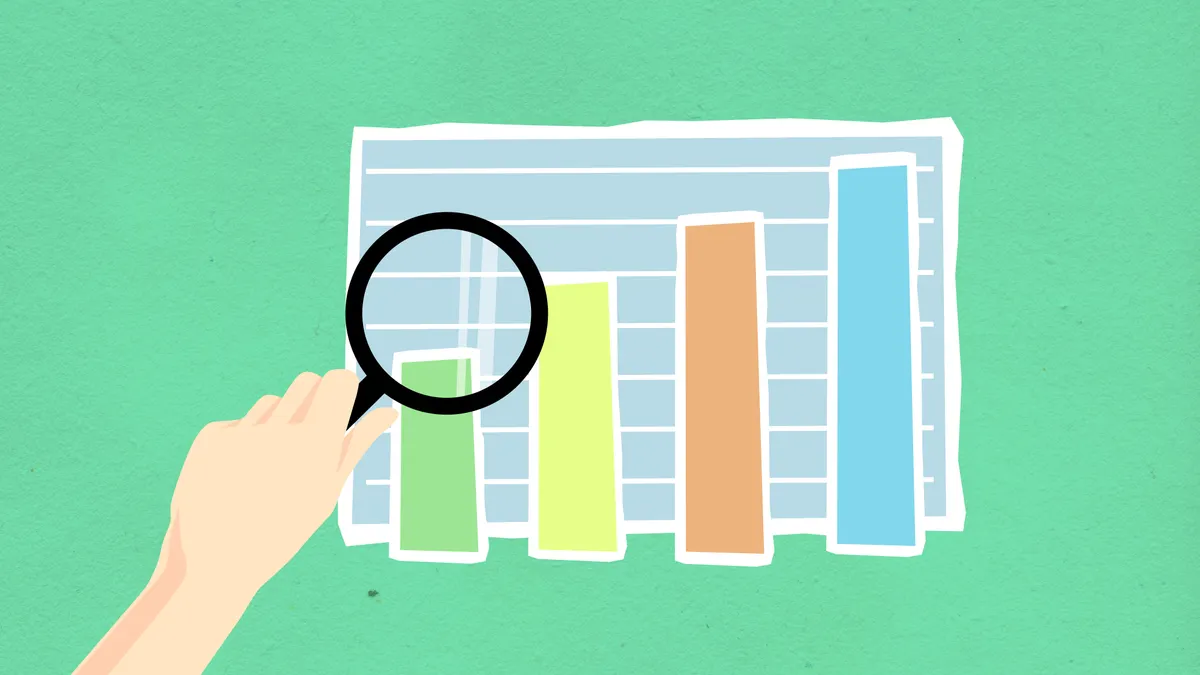 Magnifying glass inspecting a bar chart